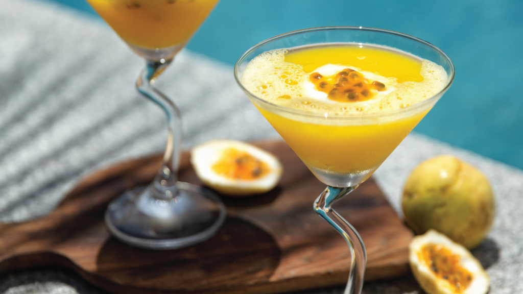 Passion fruit drinks served overlooking the turquoise lagoon at Kandima Maldives.